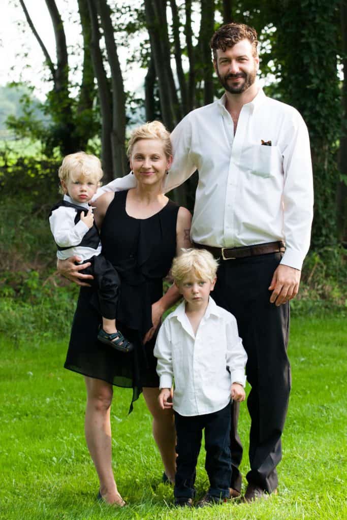 portrait of mother and father with two sons