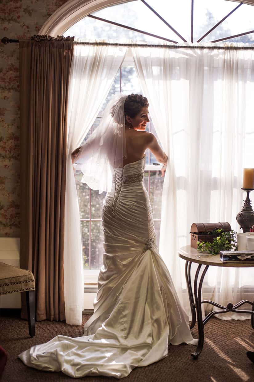 Bridal gown backlit at Penn Oaks Country Club